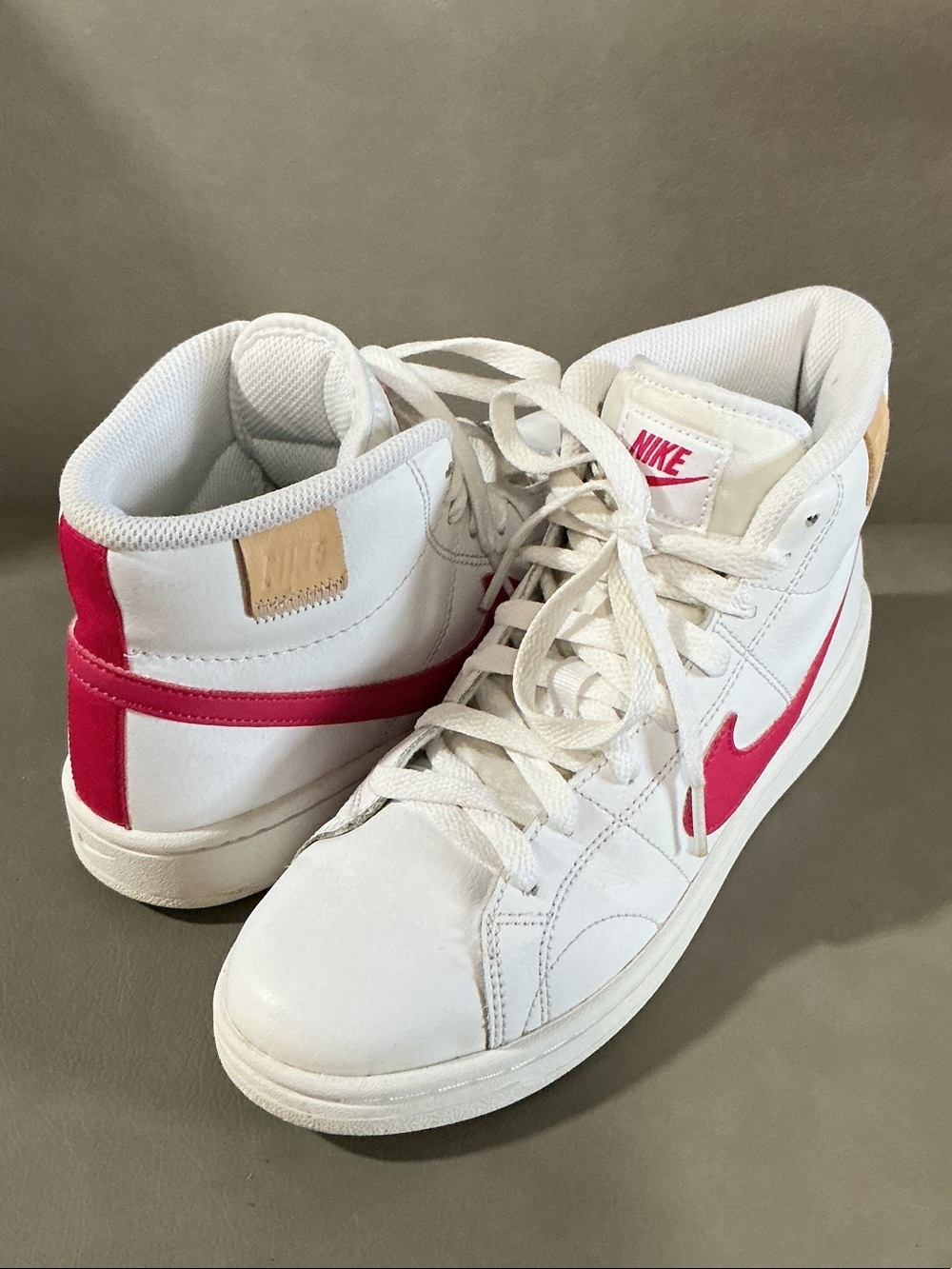 Nike Women's White Sneakers with Pink Swoosh High-Top